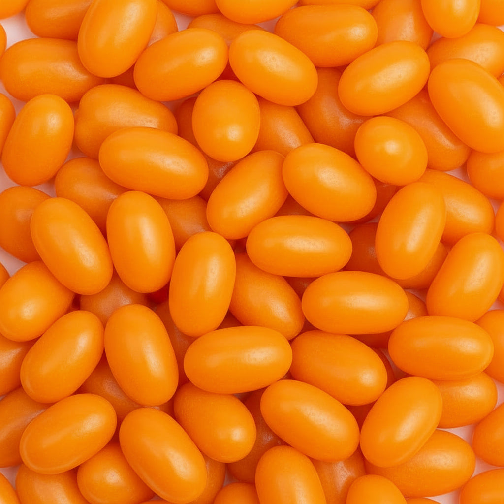 orange jelly beans on a white background