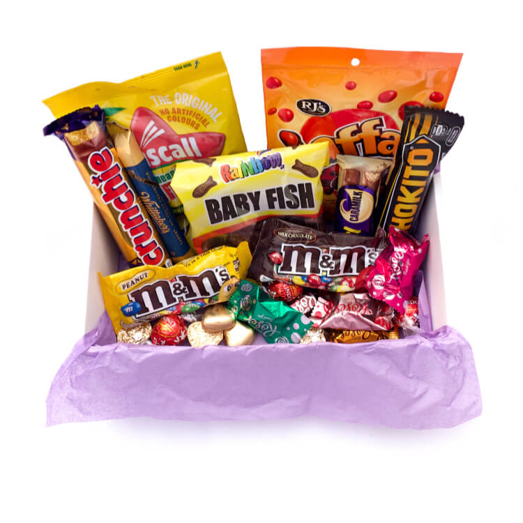 An Assortment of Chocolate Bars and Chocolate Treats in a Gift Box