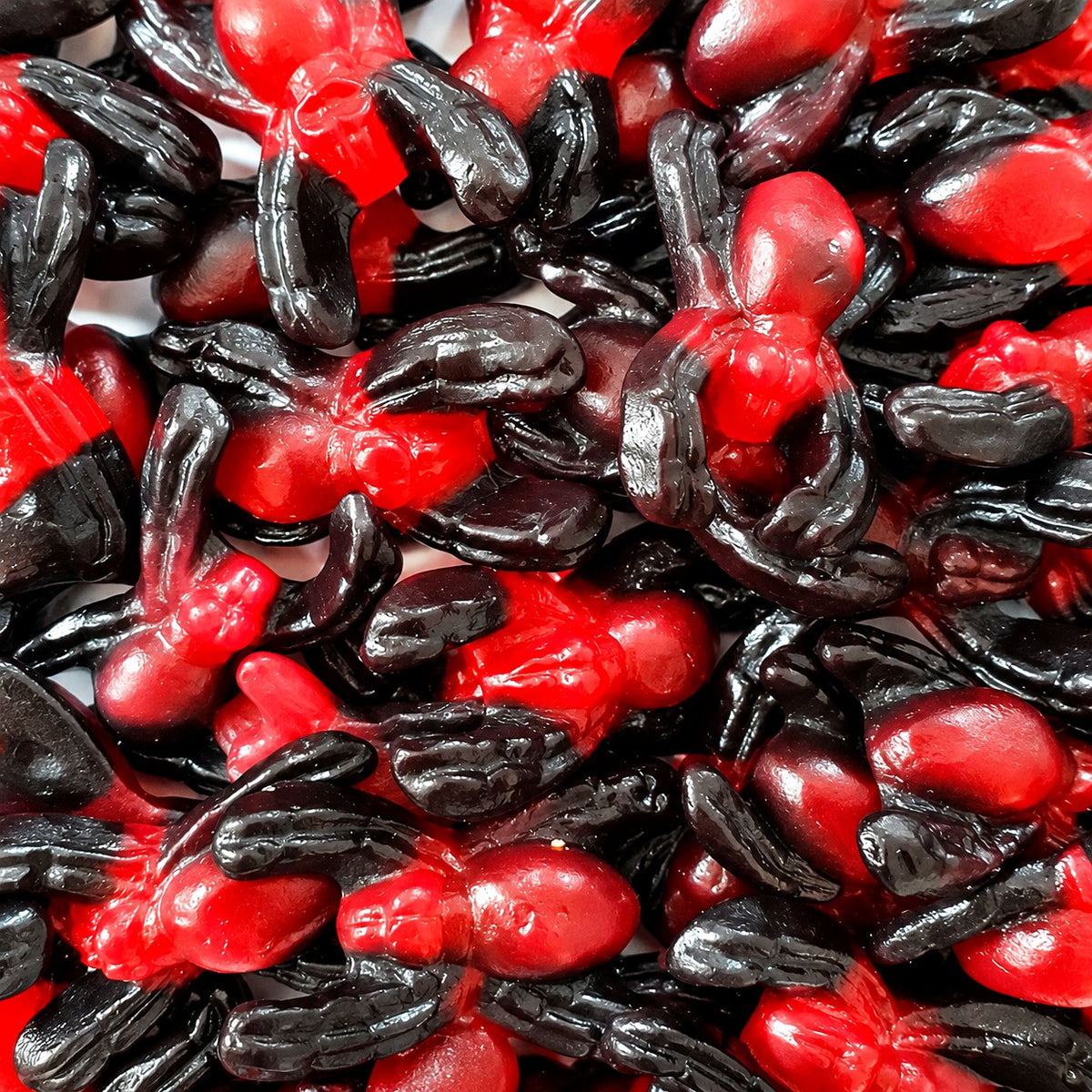 Rainbow Spiders - red and black raspberry gummy spiders
